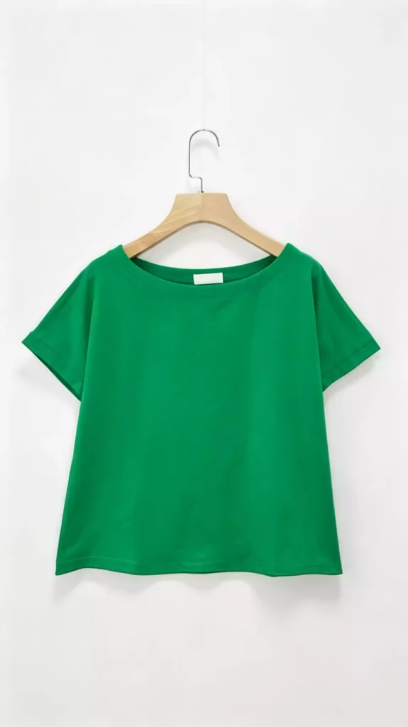 A plain green crew-neck short-sleeve t-shirt displayed on a hanger.
