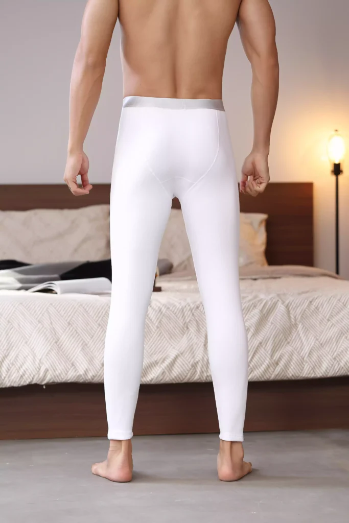 Rear view of a man wearing white compression leggings, showing a sleek, fitted, and comfortable design.