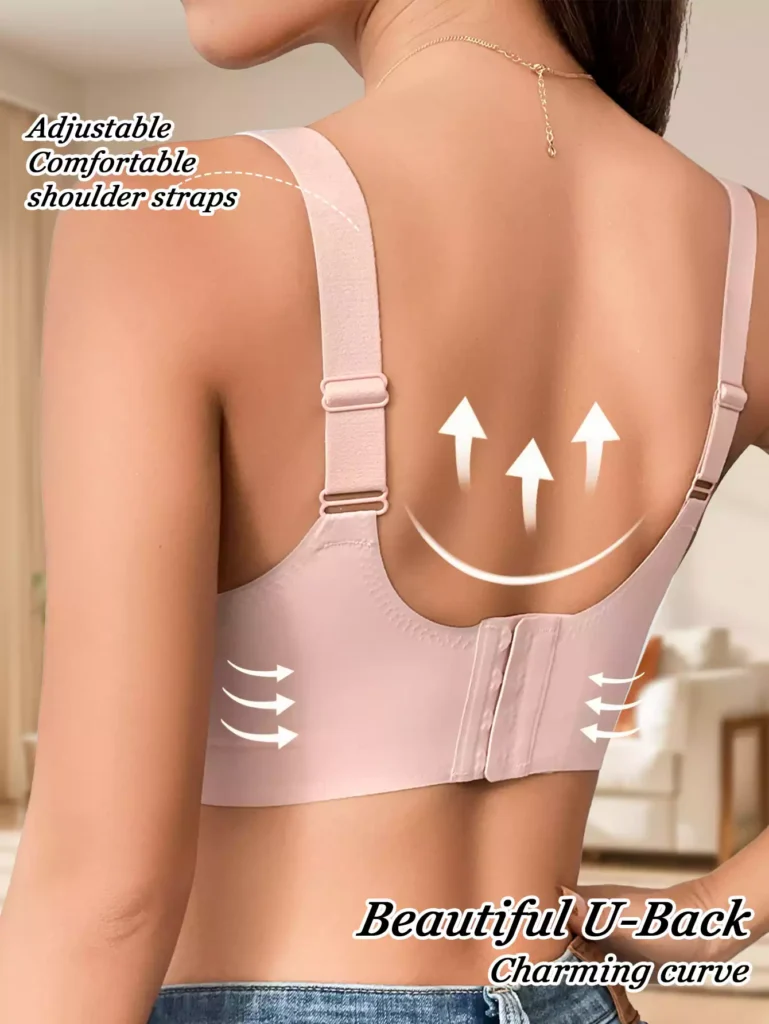 Back view of a woman wearing a comfortable pink bra featuring adjustable straps and a U-shaped back design for a smooth silhouette